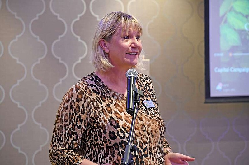 Turpentine Creek Wildlife Refuge founder and president Tonya Smith talks to Hot Springs National Park Rotary Club about the animal rescue located in Eureka Springs Wednesday at the DoubleTree by Hilton Hot Springs. (The Sentinel-Record/Lance Brownfield)