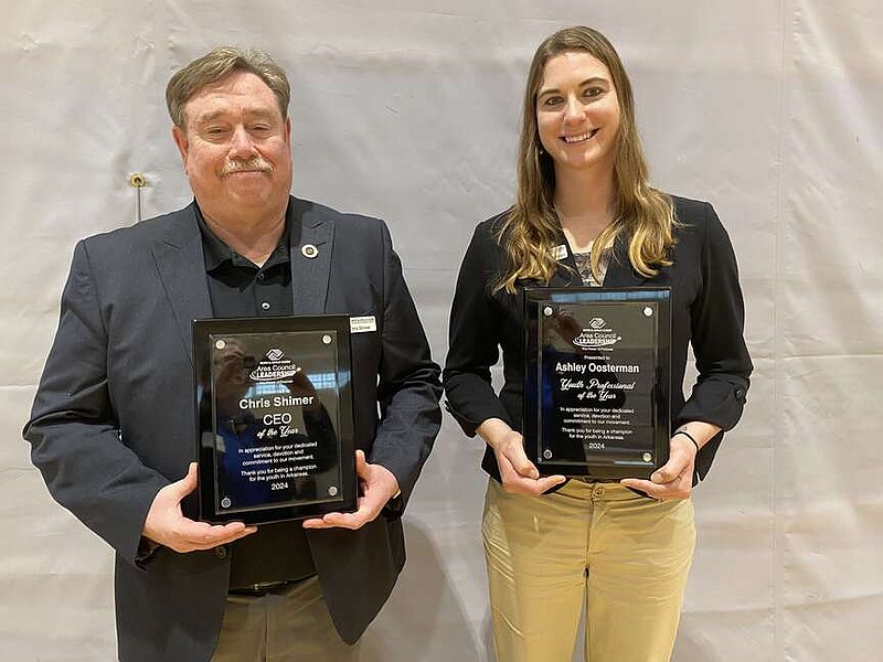 Photo submitted Chris Shimer and Ashley Oosterman display their awards at the Arkansas Alliance for Boys and Girls Club Spring Summit on April 10 in Benton, Ark. Shimmer received the Arkansas Boys and Girls Club CEO of the Year Award and Oosterman received the Arkansas Boys & Girls Club Youth Development Professional of the Year Award. This is the fourth consecutive year that a staff professional from the Boys & Girls Club of Western Benton County has received a state award.