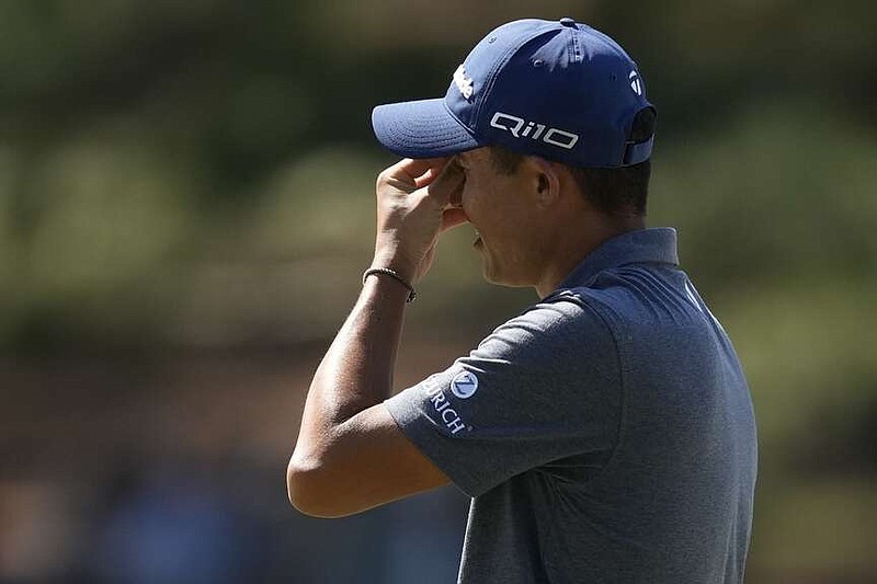 Collin Morikawa reacts after missing a putt on the seventh hole during final round at the Masters golf tournament at Augusta National Golf Club Sunday, April 14, 2024, in Augusta, Ga. (AP Photo/David J. Phillip)