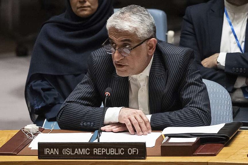 Iran's U.N. Ambassador, Amir Saeid Iravani, addresses the United Nations Security Council chamber during an emergency meeting at U.N. headquarters, Sunday, April 14, 2024. (AP Photo/Yuki Iwamura)