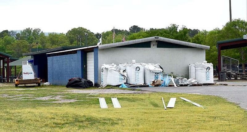 Large bundles are stacked against the Kimery Park concession stand Monday. It's undergoing a roughly $300,000 renovation. (The Sentinel-Record/Donald Cross)