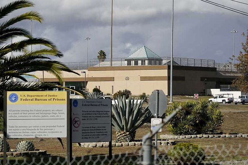 FILE - The Federal Correctional Institution stands in Dublin, Calif., Dec. 5, 2022.  The federal Bureau of Prisons says it is planning to close a women's prison in California known as the “rape club” despite attempts to reform the troubled facility after an Associated Press investigation exposed rampant staff-on-inmate sexual abuse.  (AP Photo/Jeff Chiu, File)