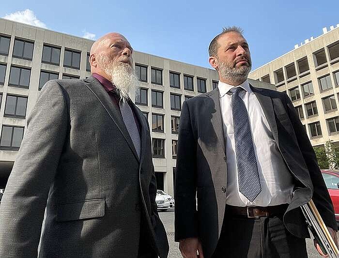 Richard Barnett, left, with his attorney, Jonathan Gross, after his sentencing hearing on Wednesday, May 24, 2023 in federal court in Washington D.C. (Arkansas Democrat-Gazette/Bill Bowden).
