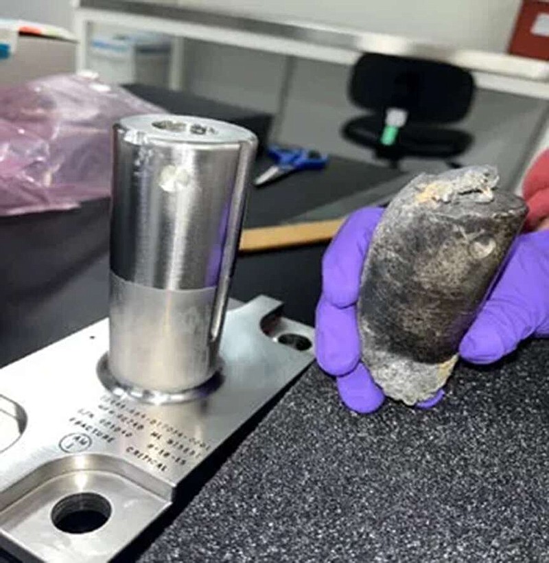 A recovered piece of metal from the NASA flight support equipment used to mount International Space Station batteries on a cargo pallet in 2021. It survived reentry through Earth's atmosphere on March 8 and hit a home in Naples, Florida. (NASA/TNS)