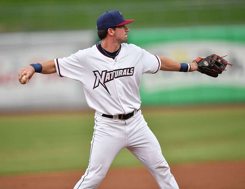 Northwest Arkansas Naturals third baseman Cayden Wallace throws between innings during play at Arvest Ballpark in Springdale. Wallace, a former Arkansas Razorback and 49th pick of the 2022 Draft by the Royals, is off to a good start this season.
(NWA Democrat-Gazette/Andy Shupe)