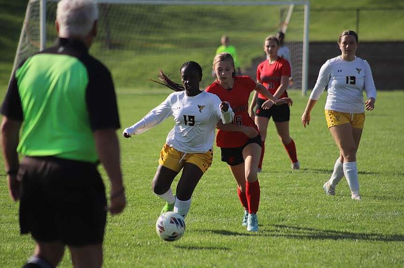 Fulton's Benitha Mahoro dribbles past an Elsberry Lady Indian Tuesday at Elsberry High School in Elsberry. (Danuser Photography/Courtesy)