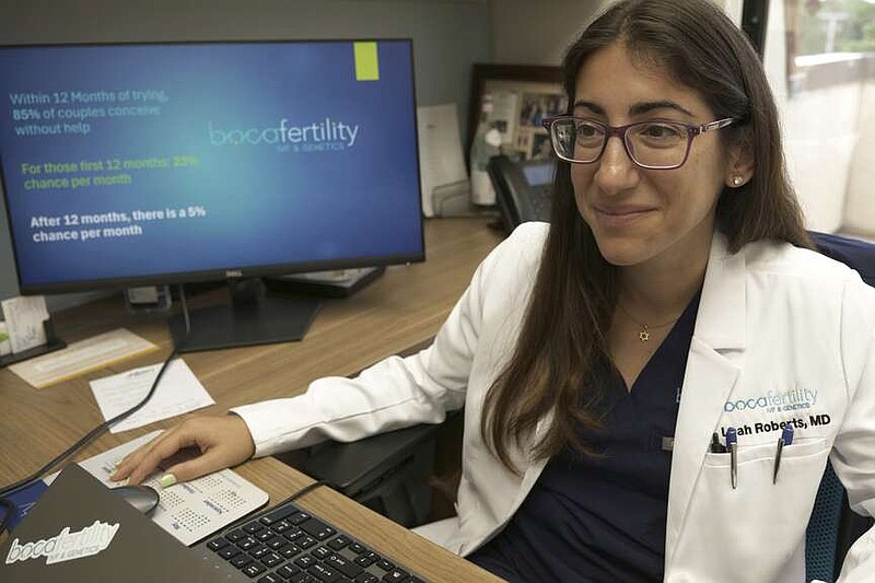 Dr. Leah Roberts, a reproductive endocrinologist-fertility specialist, discusses Florida's six-week abortion ban, which took effect Wednesday, May 1, 2024, in her office and laboratory in Boca Raton, Fla., Tuesday, April 29. (AP Photo/Daniel Kozin)