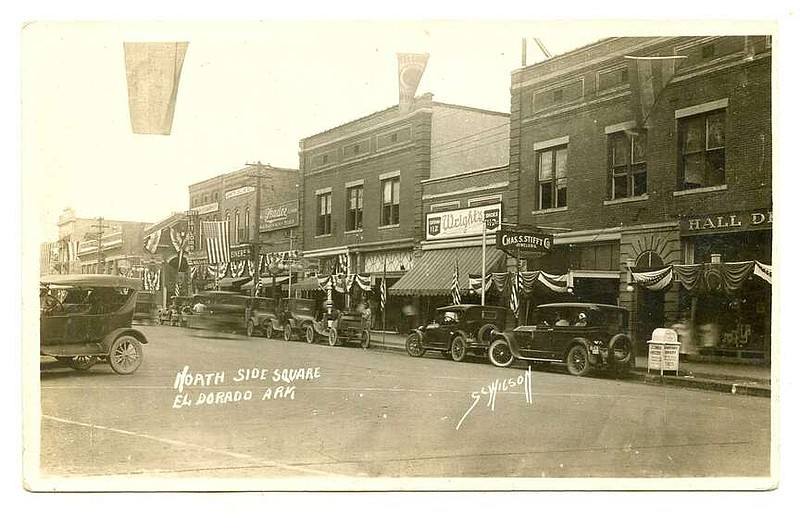 El Dorado, circa 1925: The block on the north side of the square was seen Thursday in 1908; here we see the horses and wagons of 1908 replaced by many cars in a town that experienced a great oil boom and much growth with the oil strike of 1921. The arched brick door to the right was also seen Thursday.

Send questions or comments to Arkansas Postcard Past, P.O. Box 2221, Little Rock, AR 72203