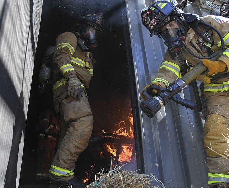 Hot Springs firefighters participate in a training exercise in March 2021. (The Sentinel-Record/File photo)