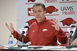 John Calipari answers questions from reporters after being introduced as Arkansas men's basketball coach Wednesday, April 10, 2024, in Fayetteville. (AP Photo/Michael Woods)