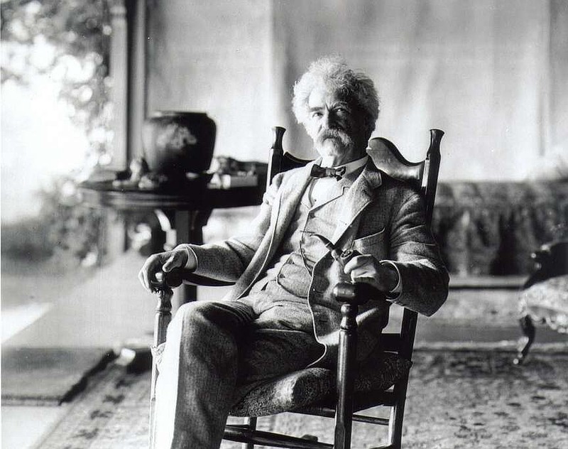 Mark Twain in a rocking chair on the porch at Quarry Farm, East Hill, Elmira, N.Y.
(Courtesy of the Mark Twain Archive)