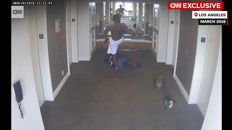 This frame grab taken from hotel security camera video and aired by CNN appears to show Sean &#x201c;Diddy&#x201d; Combs attacking singer Cassie in a Los Angeles hotel hallway in March 2016. (Hotel Security Camera Video/CNN via AP)