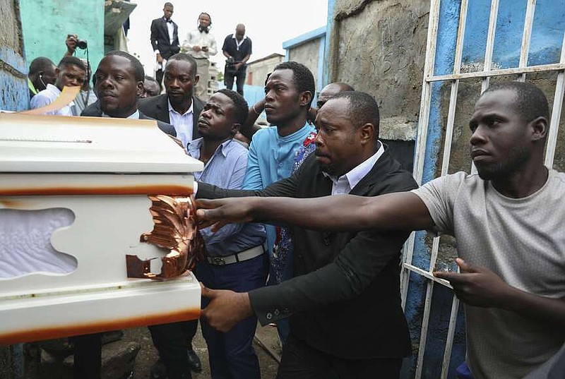Funeral held for mission head killed with US couple in Haiti