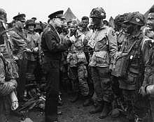 Gen. Dwight D. Eisenhower meets with members of the 101st Airborne Division in England before they board planes for the invasion of Normandy. 
(National Archives)