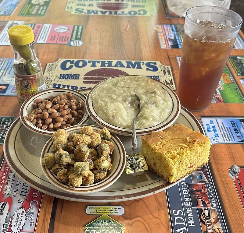 Cotham's in the City is a popular lunchtime destination, especially on Tuesdays when the daily special is chicken and dumplings. Sides shown are black-eyed peas and fried okra, with jalapeño cornbread and a glass of iced tea. Don't forget the pepper sauce.

(Arkansas Democrat-Gazette/Jerry McLeod)