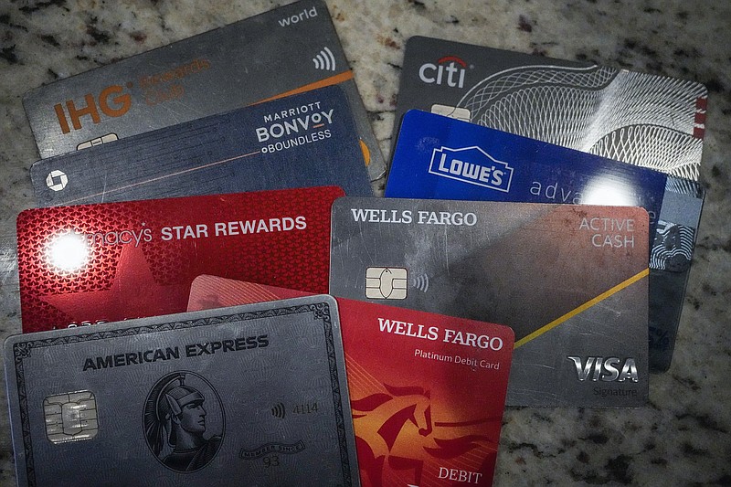 FILE - A variety of credit cards are shown on Jan. 18, 2024, in Atlanta. Seriously overdue credit card debt is at the highest level in 14 years, and people 35 and under are struggling more than other age groups to pay their bills. (AP Photo/Mike Stewart, File)