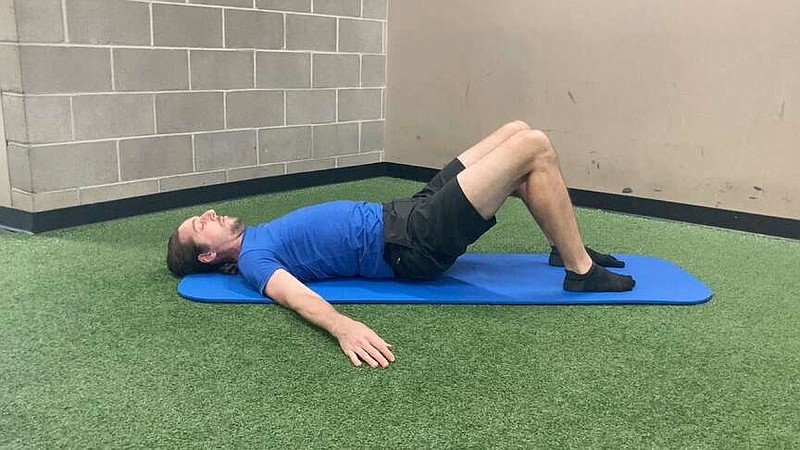 In this first of three photos, Paul Fajer demonstrates Lumbar Windshield for Matt Parrott's Master Class. (Arkansas Democrat-Gazette/Kimberly Dishongh)