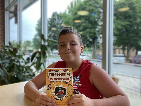 Nine-year-old Lincoln author raises money to distribute free books to local children