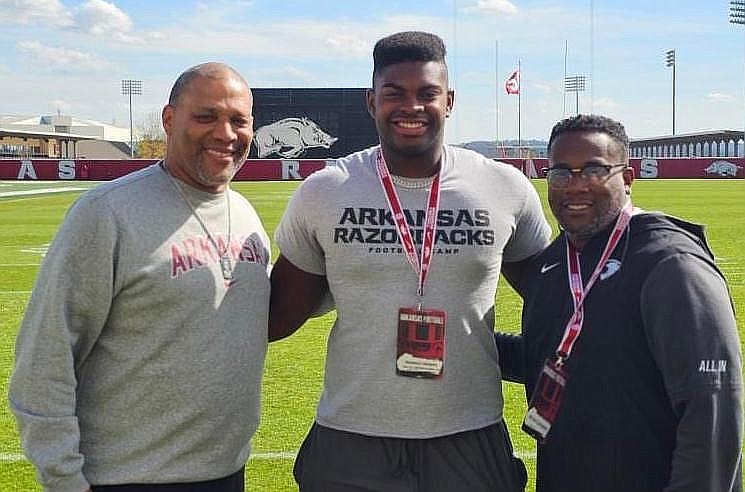 Arkansas defensive line coach Deke Adams (left), 4-star defensive tackle Reginald Vaughn (middle) and Hartfield Academy defensive coordinator Ryan Lindsey.