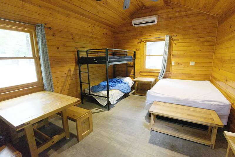 Cozy cabins like tent with roof at Devil’s Den State Park Northwest