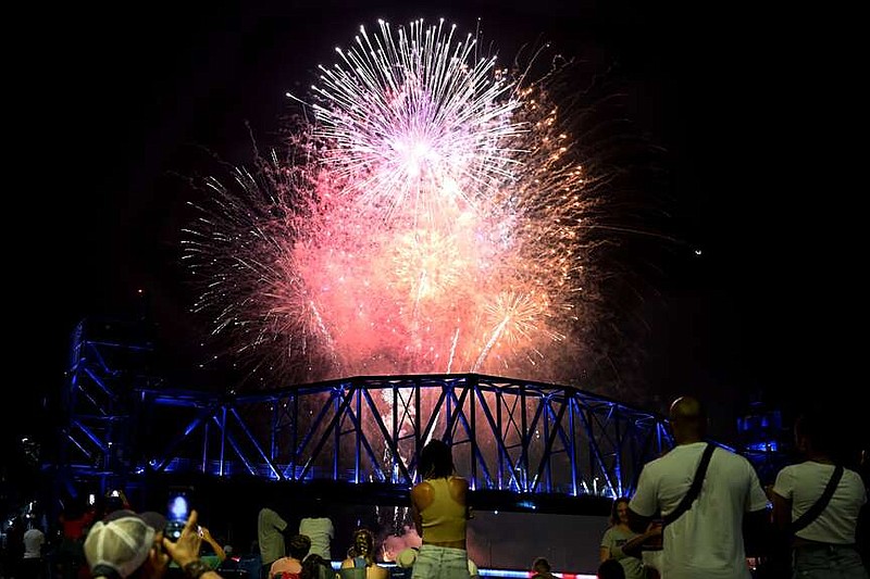 Fireworks erupt over Riverfront Park at the conclusion of the 2023 Pops on the River celebration. 
(Democrat-Gazette file photo/Stephen Swofford)