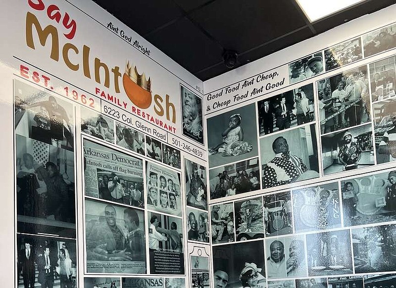 A display wall in one corner of the new Say McIntosh Restaurant shows photographs of late paterfamilias Robert "Say" McIntosh, members of his family and a collection of newspaper pages.

(Arkansas Democrat-Gazette/Eric E. Harrison)