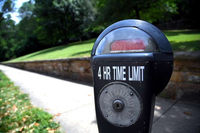 The city will remove all of its roughly 300 coin-operated meters from downtown. The 1970s-era technology is prone to malfunction and generates revenues that cover only a fraction of parking fund expenses. (The Sentinel-Record/Donald Cross)