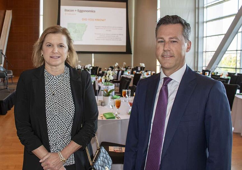 Leigh Ann Biernet and Jason Holsclaw on 07/19/2024 at Arkansas Economcis breakfast event Bacon and Eggonomics at the Clinton Center. (Arkansas Democrat-Gazette/Cary Jenkins