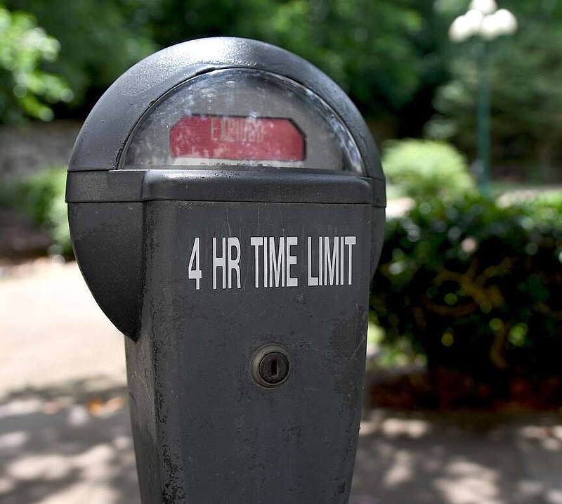 A downtown parking meter displays an "expired" message recently. (The Sentinel-Record/Donald Cross)