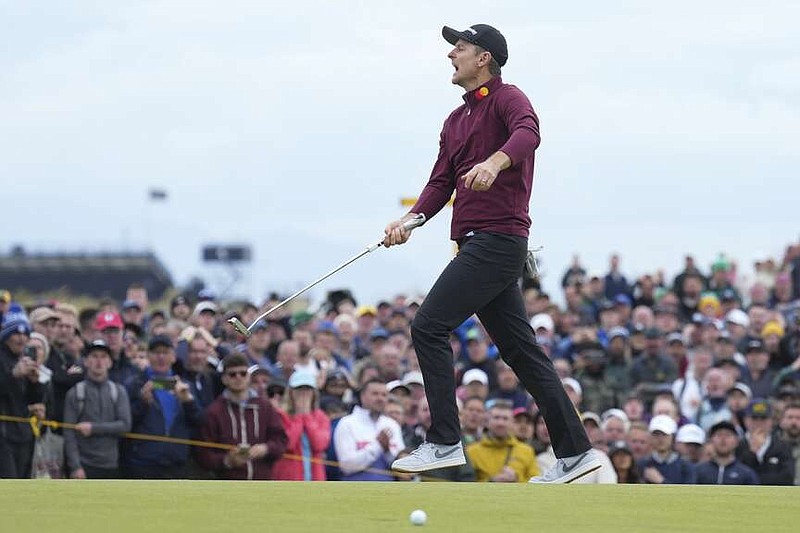 Justin Rose of England reacts after missing a putt on the 12th green during his final round of the British Open Golf Championships at Royal Troon golf club in Troon, Scotland, Sunday, July 21, 2024. (AP Photo/Jon Super)