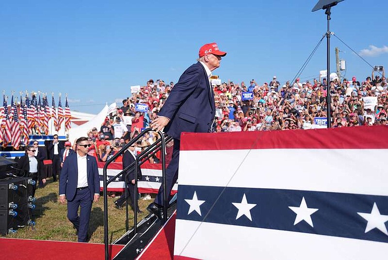 Former president Donald Trump walks onstage during a campaign rally in Butler, Pa., on July 13. MUST CREDIT: Jabin Botsford/The Washington Post