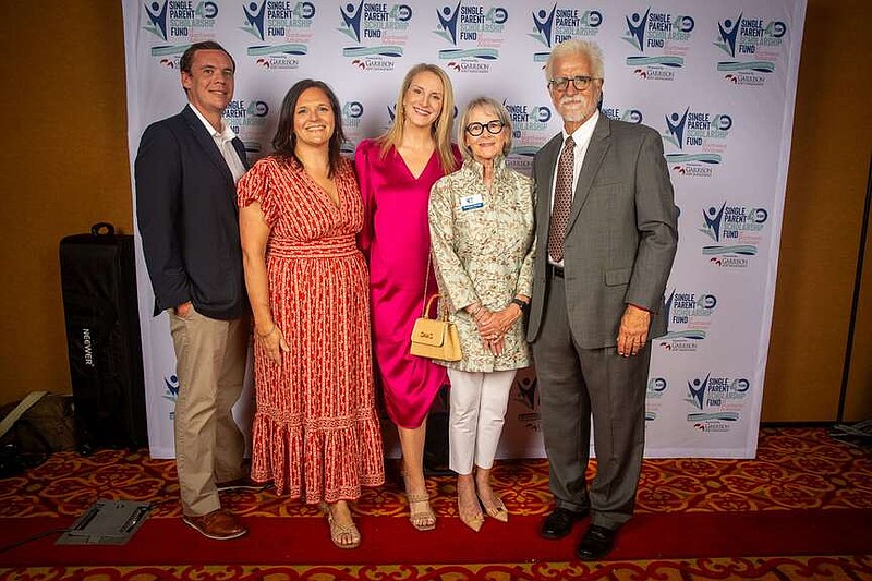 Blake Sutton (from left), Lindsay Ortego, Lauren Ortego and Shannon and Terryl Ortego attend the Single Parent Scholarship Fund of Northwest Arkansas Spark of Hope fundraiser July 24 at the Rogers Convention Center in Rogers. The organization honored the Shannon and Terryl with their Outstanding Individuals award.

(Submitted photo)