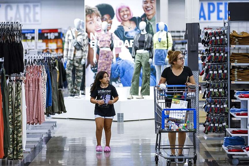 Shoppers at a Walmart Superstore in Secaucus, New Jersey, Thursday, July 11, 2024. (AP Photo/Eduardo Munoz Alvarez)