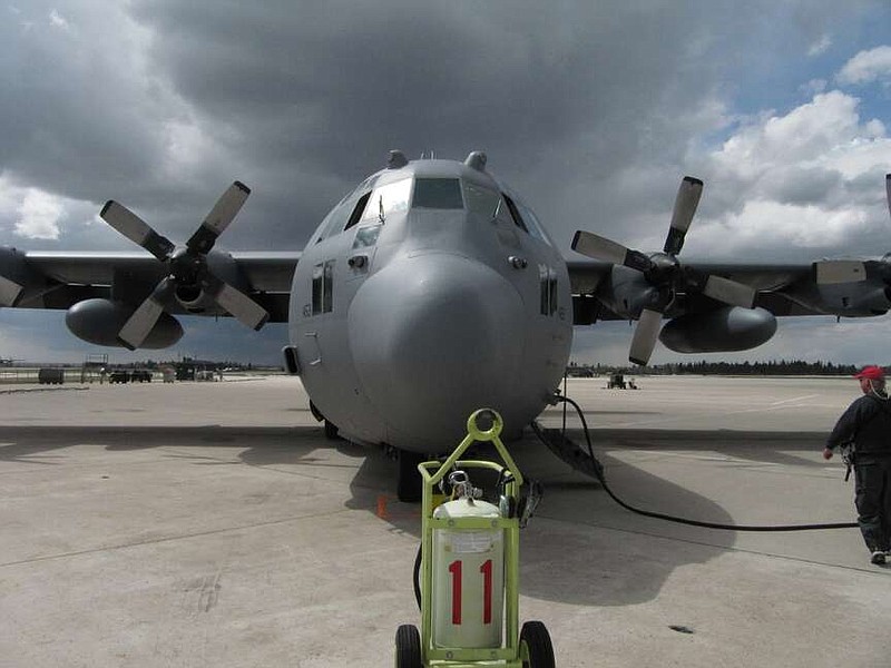 FILE - A North Carolina Air National Guard C-130 cargo plane is shown in this May 7, 2013 photo. (AP Photo/Mead Gruver)