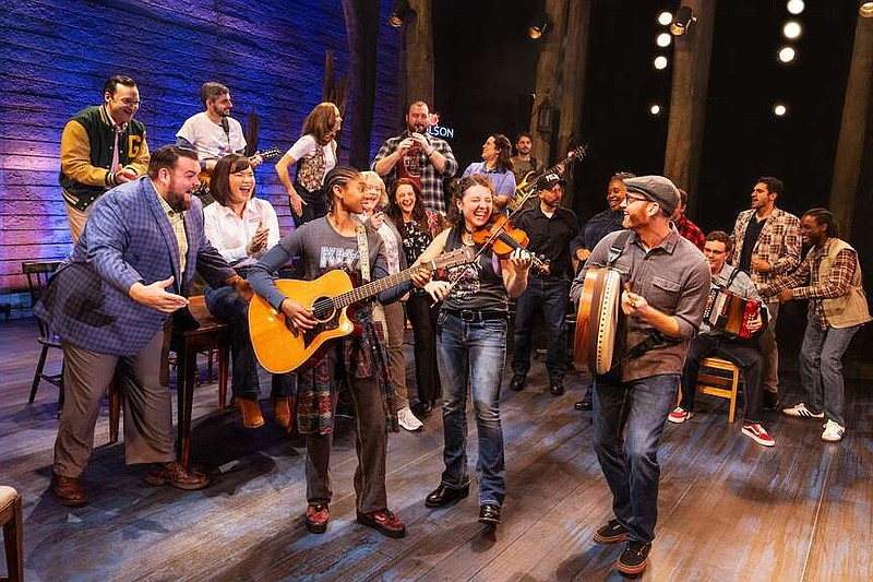 The passengers stranded in the tiny town of Gander, Newfoundland, on Sept. 11, 2001, and the townsfolk who made them welcome get together for song and dance in the musical "Come From Away."

(Special to the Democrat-Gazette/Matthew Murphy for MurphyMade)