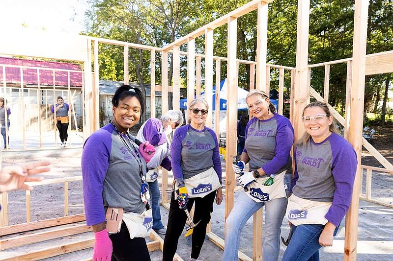 Participants in last year's Women Build event take a break from working on a house. This year's event is set for Oct. 1-5. (Submitted photo)