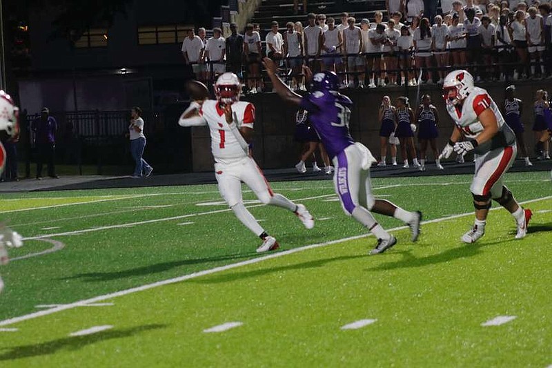 Photo by Jayla Carter
Trying to make something happen
Camden Fairview's Darre'll “Juney” Atkins Jr. evades an El dorado defender in the second half as he tries to pass down field. The Cardinals lost 35-34.