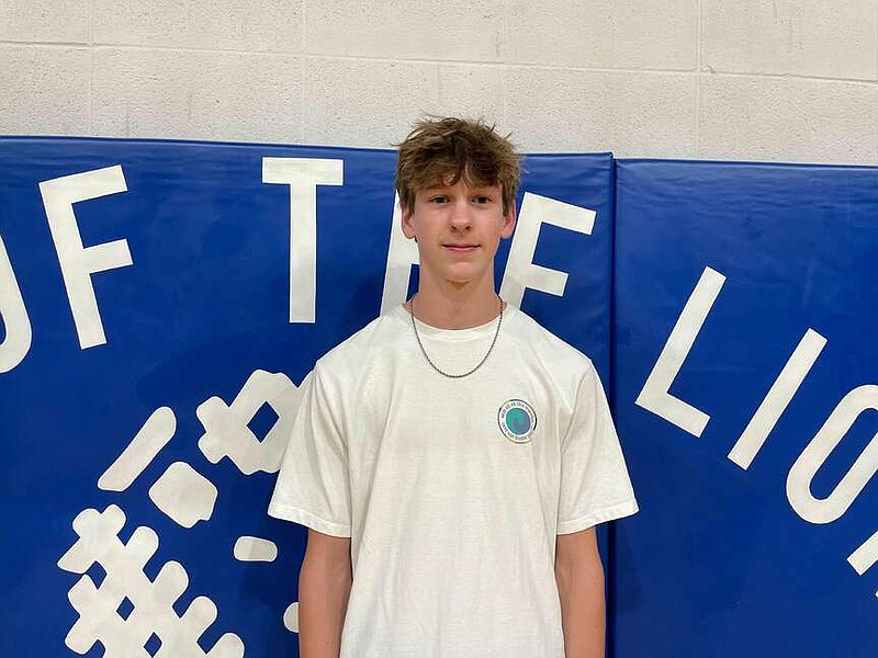 Jessieville junior cross country runner Tristen Rodgers stands in the gym at Jessieville High School. (The Sentinel-Record/Braden Sarver)