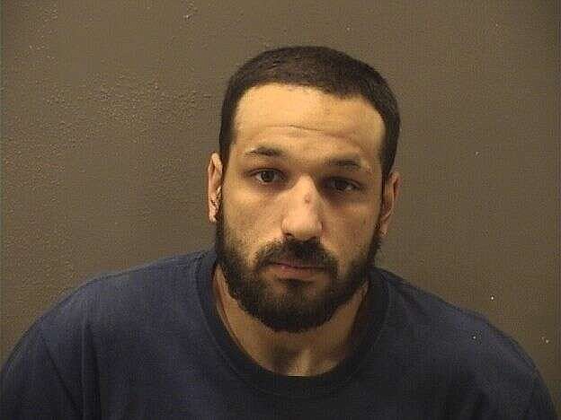 Man arrested after allegedly fleeing police and deputies on stolen ...