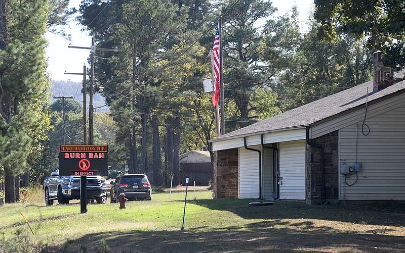 A sign at the Lake Hamilton Fire Station on Highway 290 alerts passersby that a burn ban is in effect Friday afternoon. (The Sentinel-Record/Donald Cross)