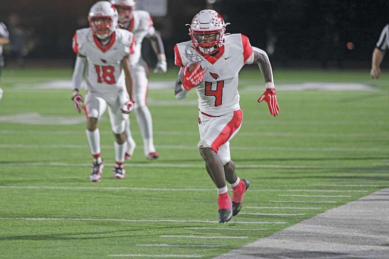 Counting them up
Camden Fairview running back/wide out Trent Haygood finds the sideline and goes for a big gain against Arkansas High. Haygood accounted for six touchdowns during the game.