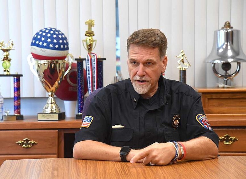 New Assistant Fire Chief Tom Braughton discuses the evolution of the Hot Springs Fire Department Monday at Central Station. (The Sentinel-Record/Donald Cross)