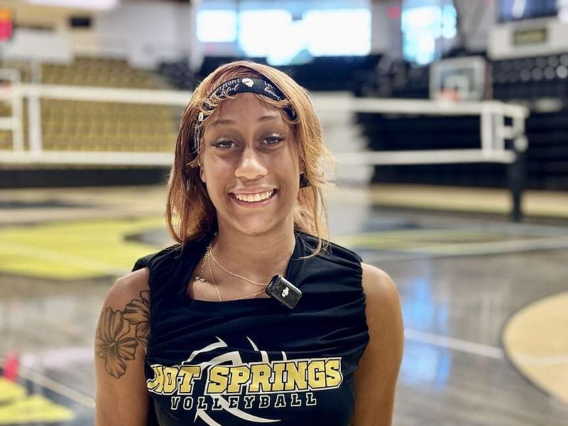 Hot Springs World Class High School senior middle hitter Imria Lowery is pictured on the court at Trojan Arena. (The Sentinel-Record/Bryan Rice)