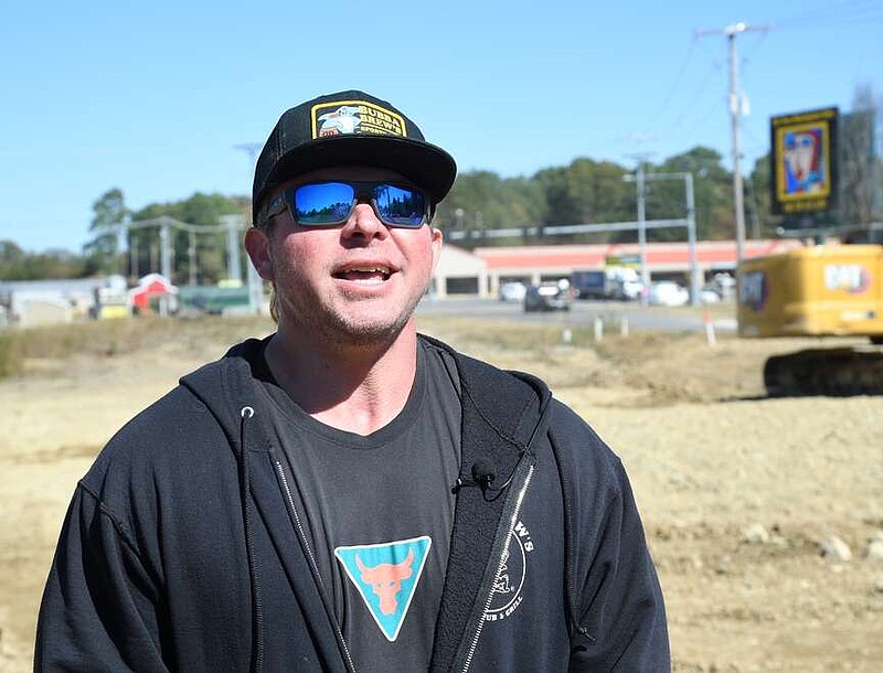 Jayson “Bubba” Bass discusses plans for the incoming Bubba Brew's Brewstillery, located at 156 S. Moore Road. The 20,000-square-foot facility will include a restaurant and a 24-hour gym. (The Sentinel-Record/Donald Cross)