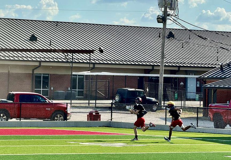 Cutter Morning Star wide receiver Drew Gonzalez runs covered passing routes during a Sep. 10 practice at Eagle Stadium. (The Sentinel-Record/Bryan Rice)