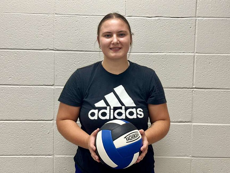 Lady Lions senior libero Alexis Castleberry holds a volleyball while inside Jessieville Sports Arena. (The Sentinel-Record/Bryan Rice)