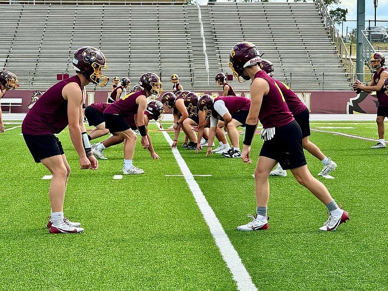 Lake Hamilton practices on Sept. 26 at Wolf Stadium. The Wolves travel to face the Shiloh Christian Saints tonight. (The Sentinel-Record/Bryan Rice)