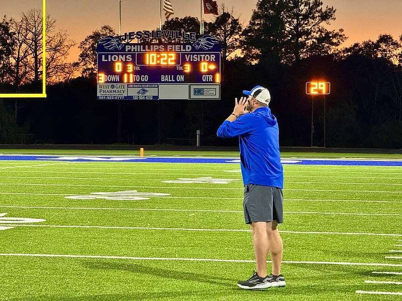 Jessieiville Lions head football coach T.J. Burk yells to his players on the field during the Lions' Oct. 18 matchup with Paris. (The Sentinel-Record/Bryan Rice)