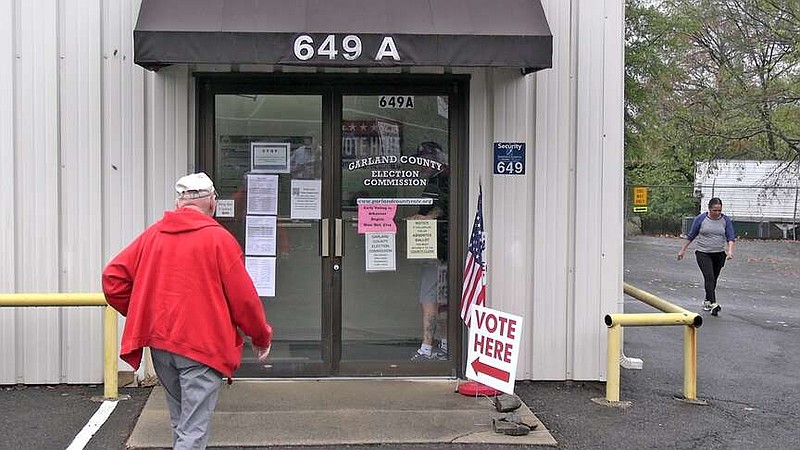 Ross Rumore enters the Garland County Election Commission Building at 649-A Ouachita Ave. on Tuesday on Election Day. (The Sentinel-Record/James Leigh)