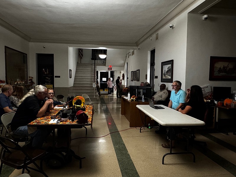 Candidate wait alongside the media and county officials for election results on Tuesday
(photo by Kate Flynn)